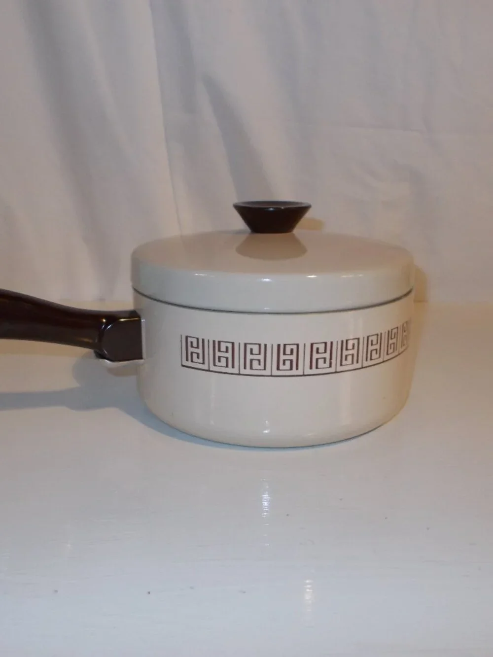 Mirro two liter saucepan and lid, almond and brown colors